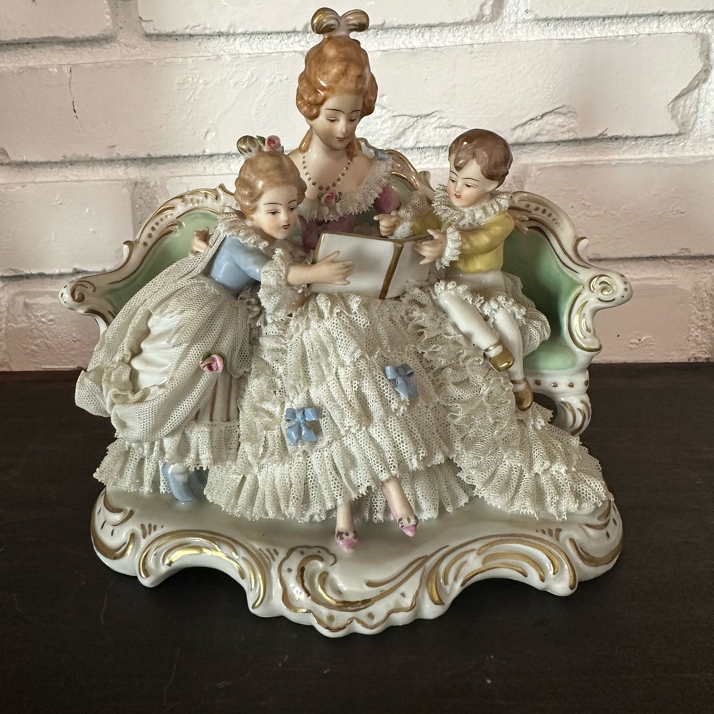 Dresden Mother and children reading book porcelain and lace figurine